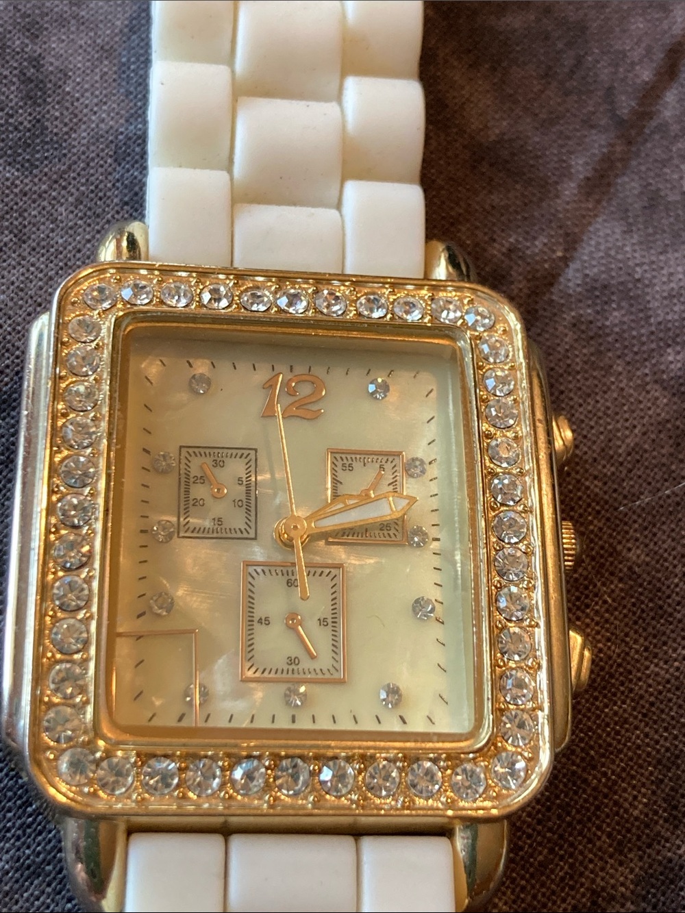 Gold-Tone Crystal Square Watch with White Strap keeps perfect time